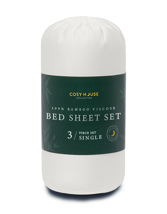 Packaged bed sheet set with a label on a white background